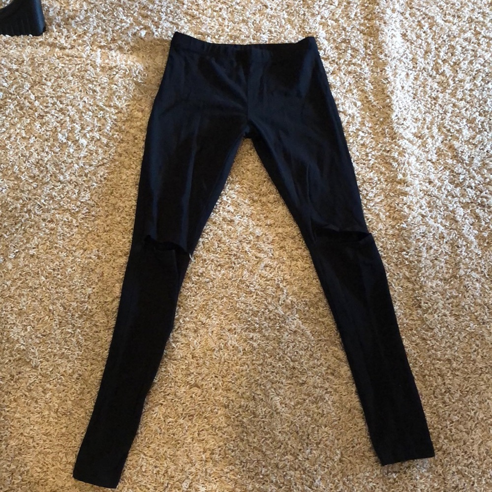 Black leggings with slits for knees